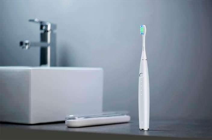 Зубная щетка Omate с приложением для смартфона и Bluetooth